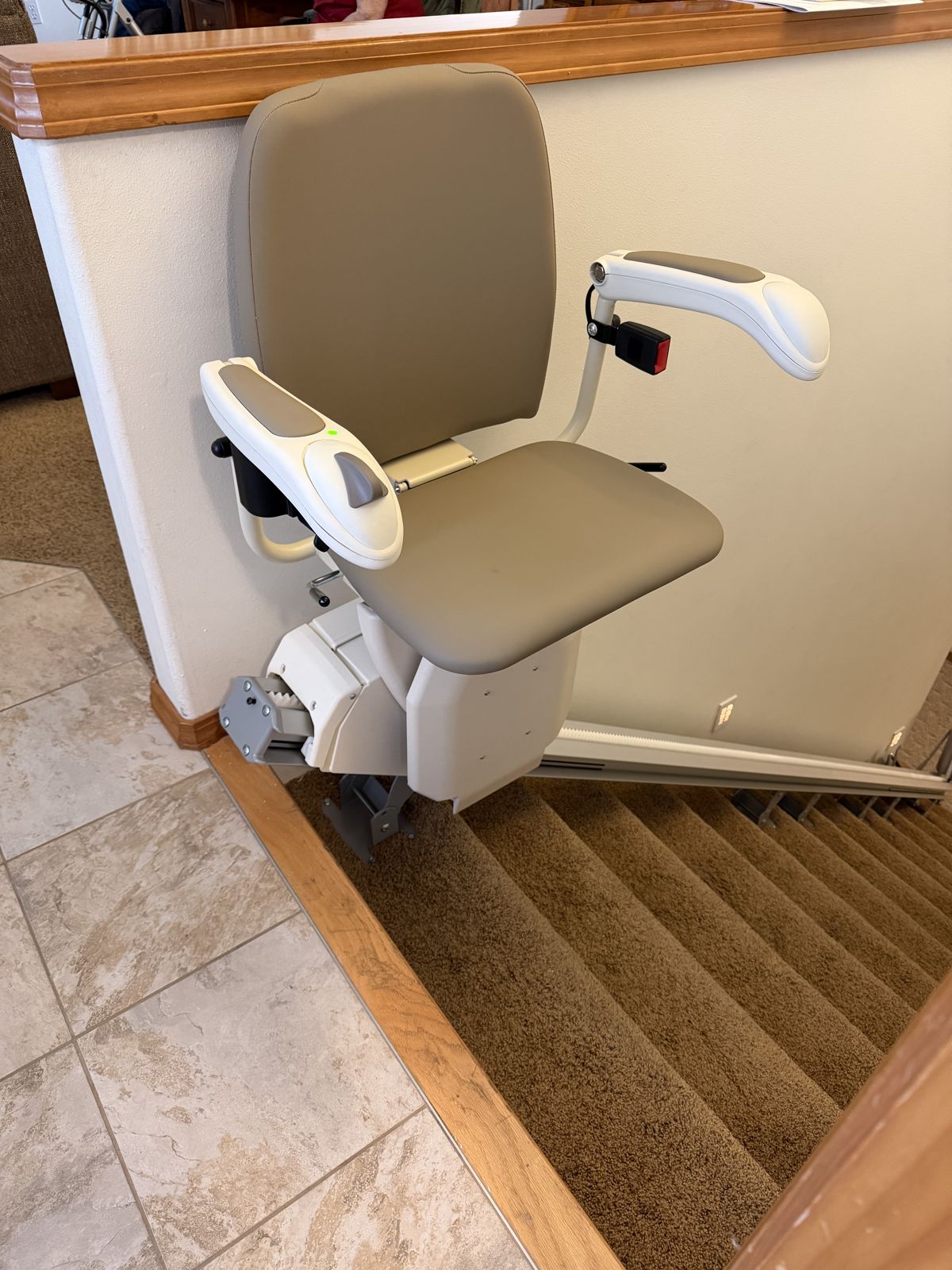 Stairlift parked at the bottom landing